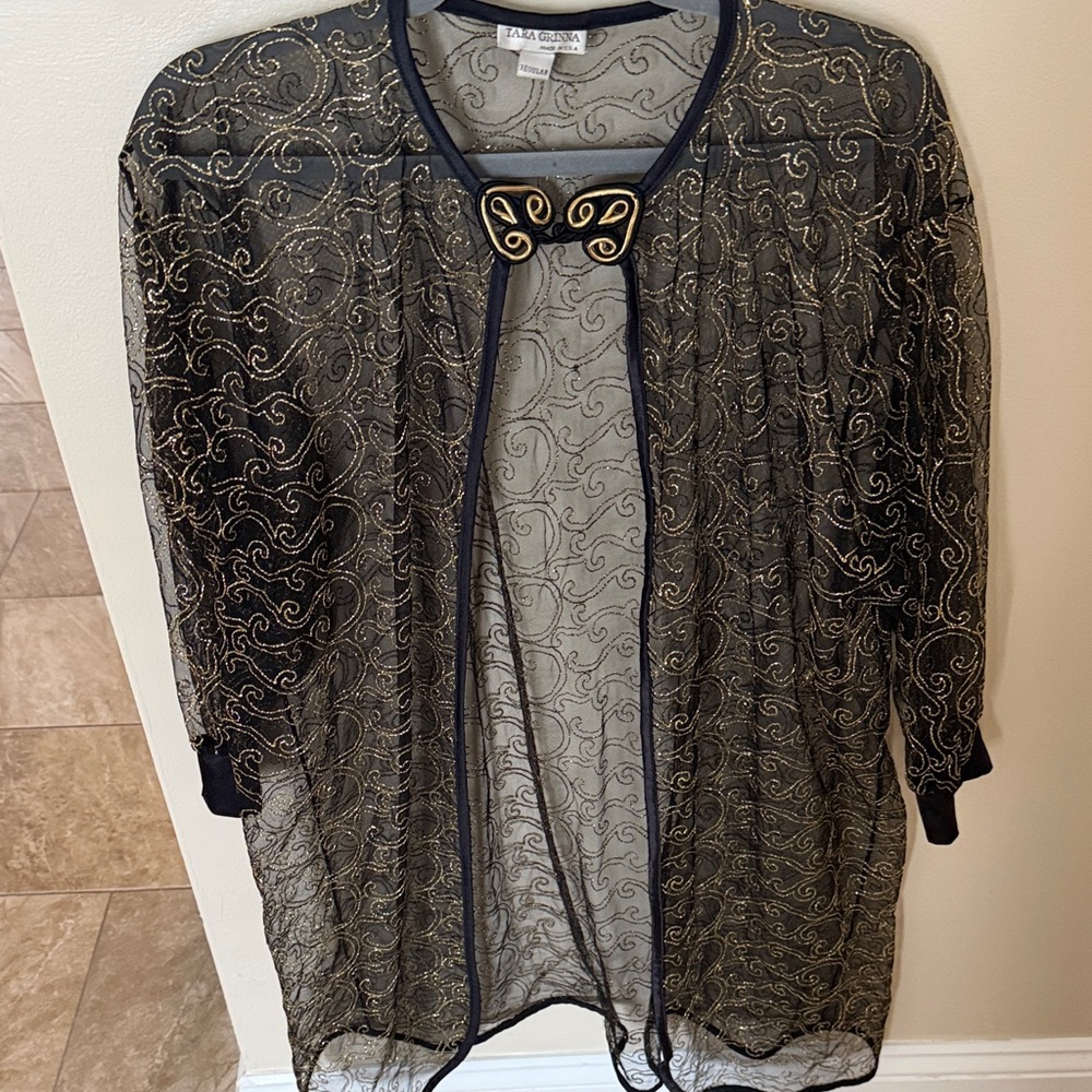 Elegant Black and Gold Cape by FAD FASHIONS